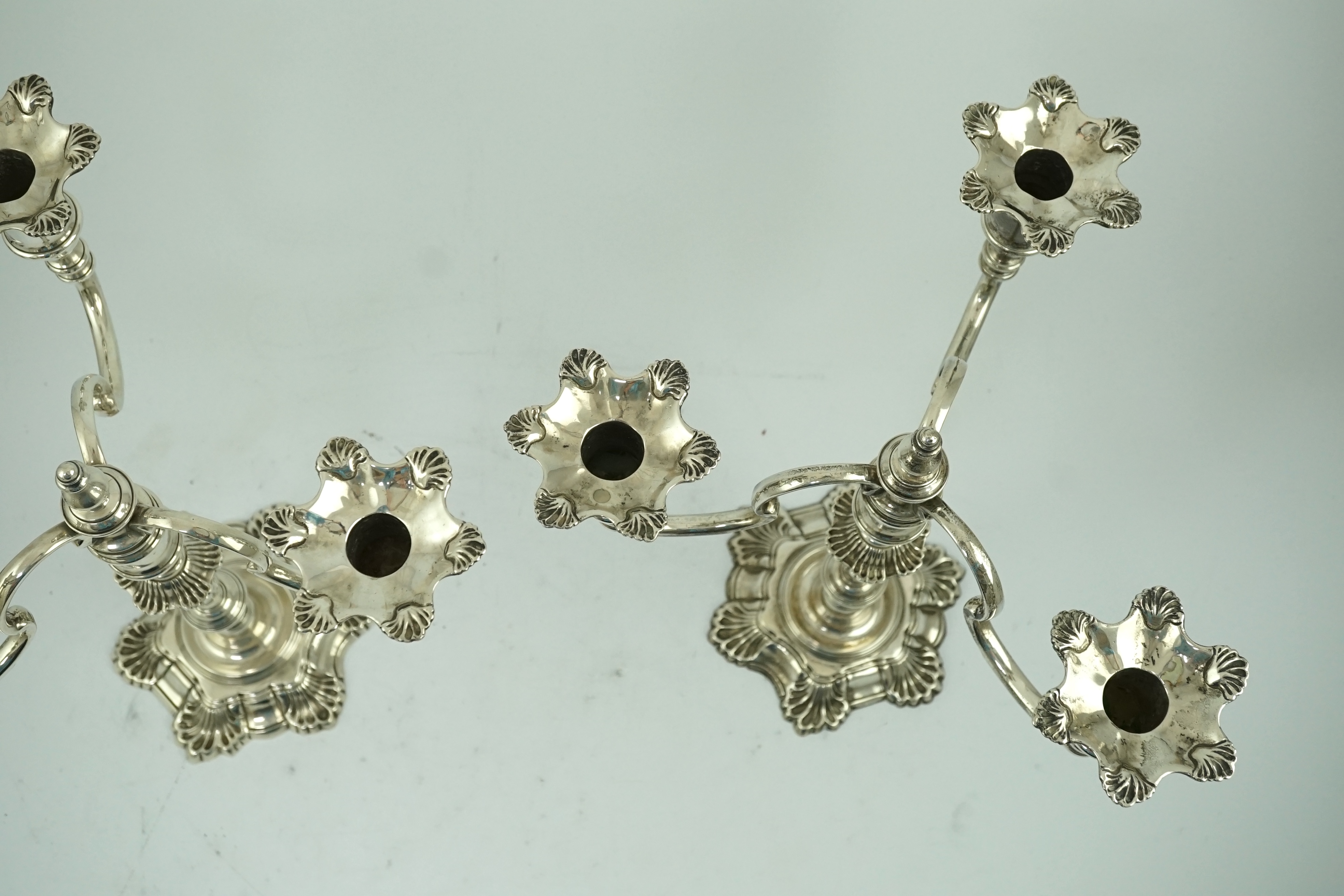 An early 20th century yellow metal and ten stone multi gem set chain link bracelet